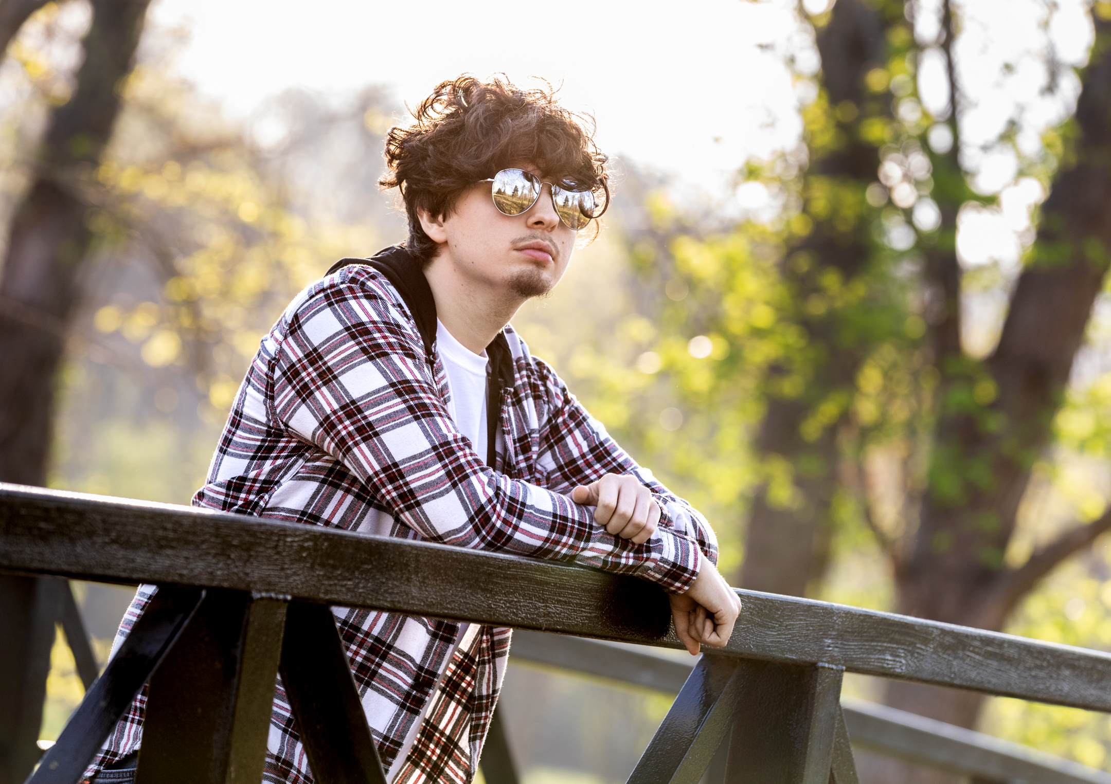 High school senior in sunglasses